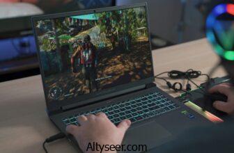 a person playing a video game on a laptop